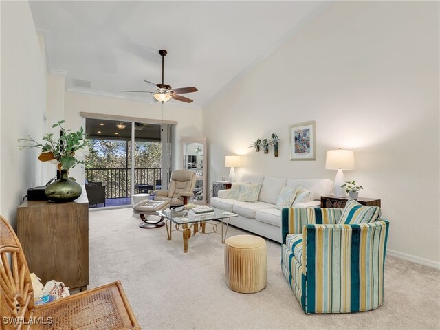 carpeted living room featuring ceiling fan and crown molding