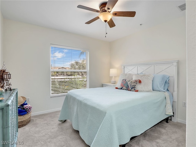 20021 Barletta Ln Unit 2223, Estero, FL 33928 - bedroom with light colored carpet, baseboards, and ceiling fan