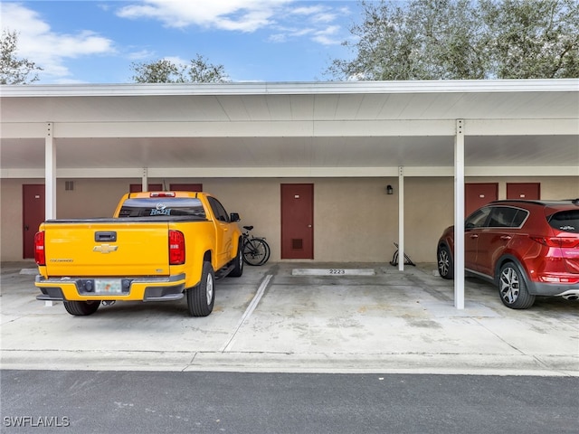 view of parking with a carport