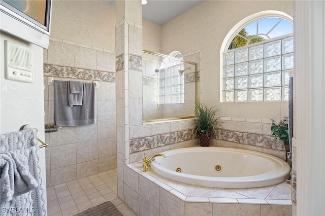 bathroom featuring plus walk in shower