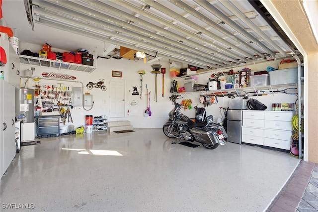 garage featuring electric water heater