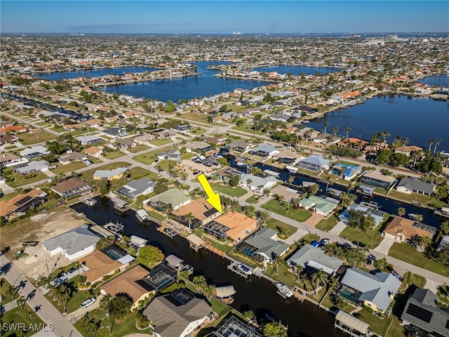 bird's eye view with a water view