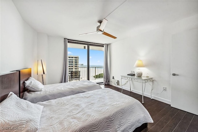 bedroom with floor to ceiling windows, access to exterior, and ceiling fan