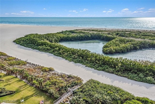 bird's eye view featuring a beach view and a water view