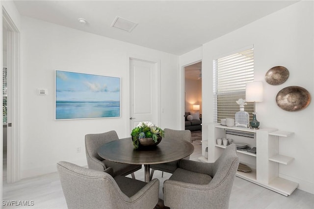 dining room featuring light hardwood / wood-style floors