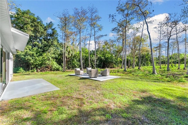 view of yard with a patio area