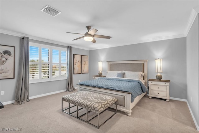 bedroom featuring ceiling fan, light colored carpet, and ornamental molding