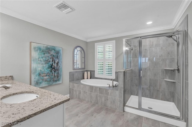 bathroom featuring tile patterned floors, vanity, separate shower and tub, and ornamental molding