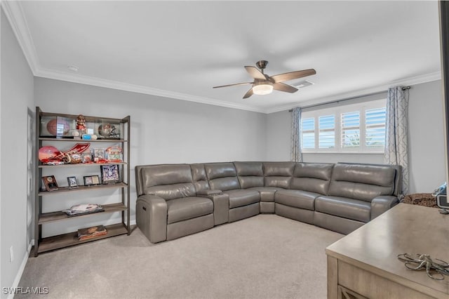 carpeted living room featuring ceiling fan and ornamental molding