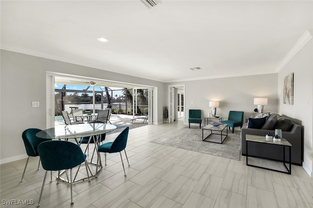 dining space featuring ornamental molding