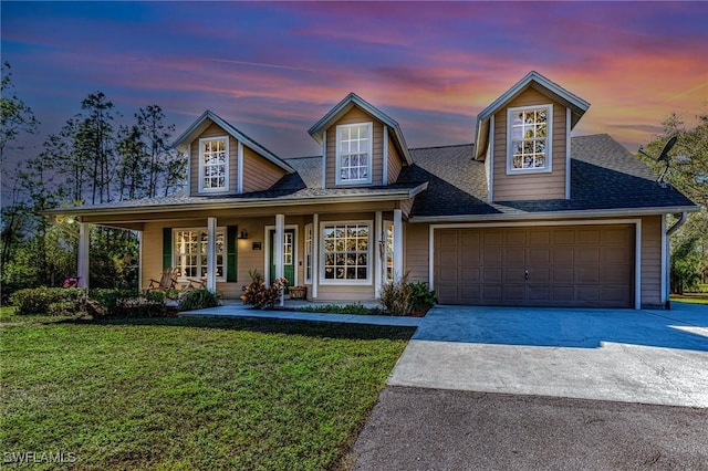 view of front of property with a yard and covered porch