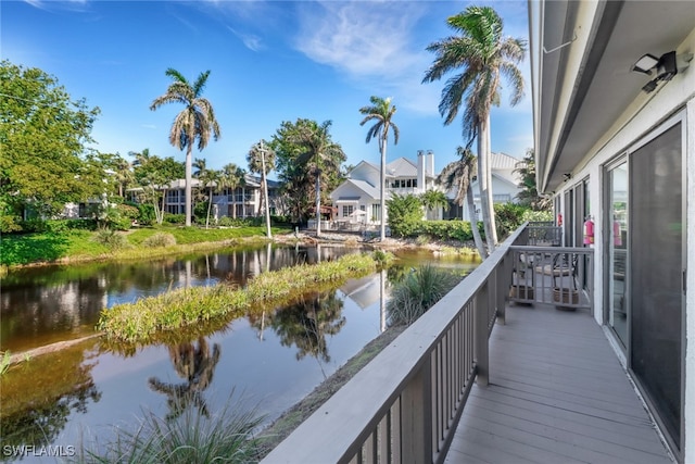 balcony featuring a water view