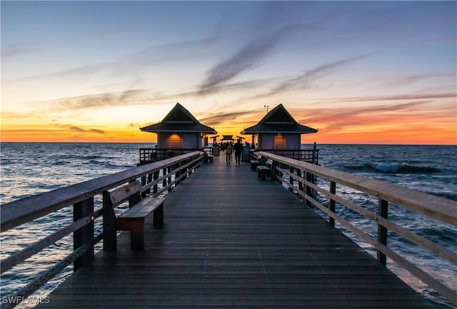 view of dock with a water view and a gazebo