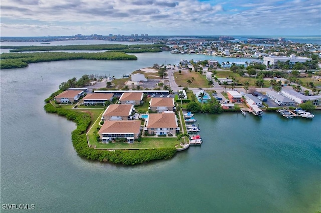 bird's eye view with a water view