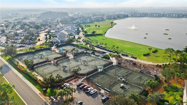 birds eye view of property featuring a water view