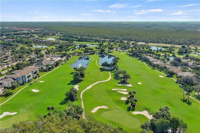 birds eye view of property featuring a water view and golf course view