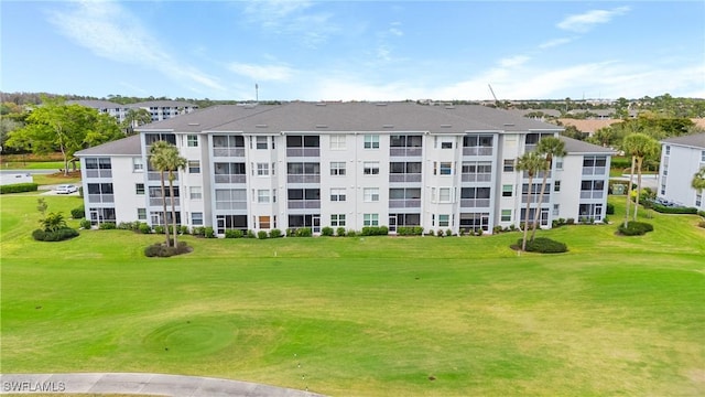 view of building exterior featuring view of golf course