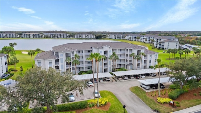 drone / aerial view featuring a water view