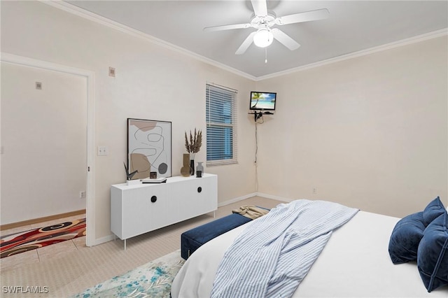 bedroom with light carpet, baseboards, and ornamental molding