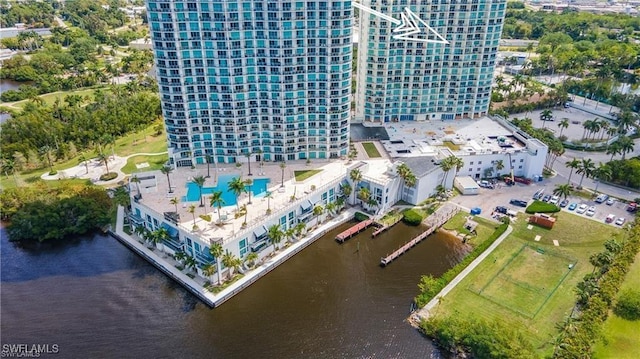 birds eye view of property featuring a water view