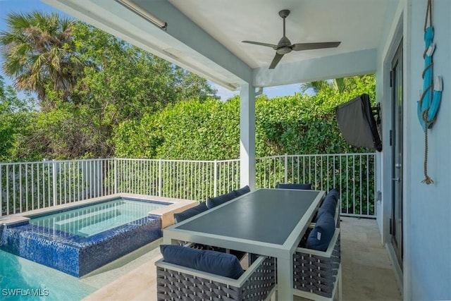 view of pool featuring a patio area, an in ground hot tub, and ceiling fan