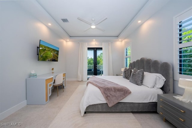 bedroom featuring access to exterior, ceiling fan, and french doors