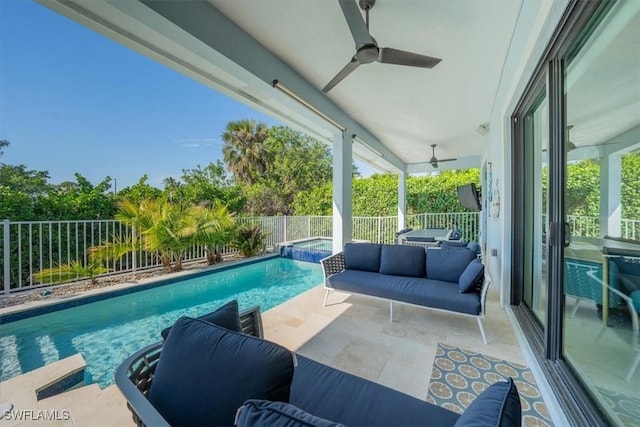 view of pool with ceiling fan, a patio area, and an in ground hot tub