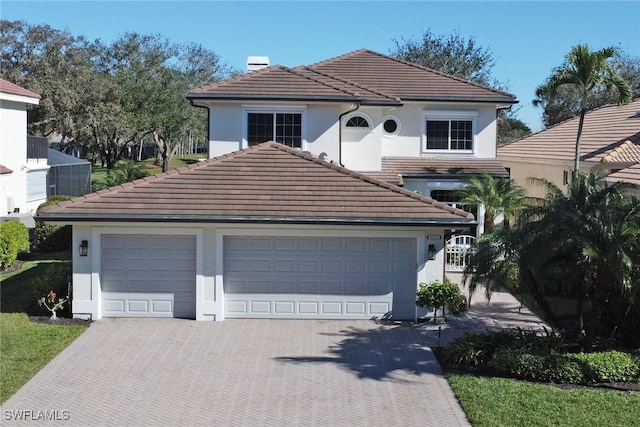 view of front of home with a garage