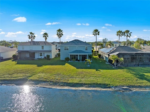 exterior space with a front yard and a water view