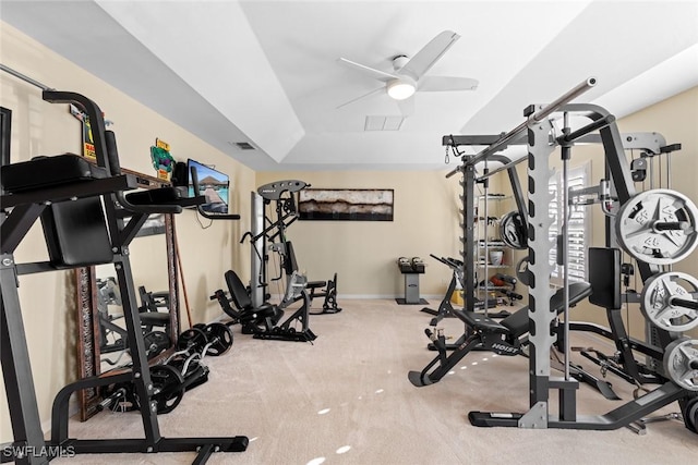 exercise room with carpet and ceiling fan