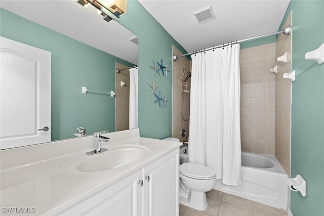 full bathroom featuring tile patterned floors, vanity, toilet, and shower / bath combo with shower curtain