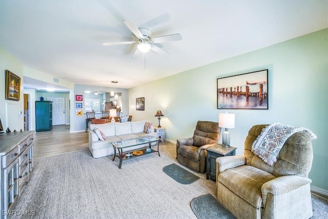 living room with ceiling fan