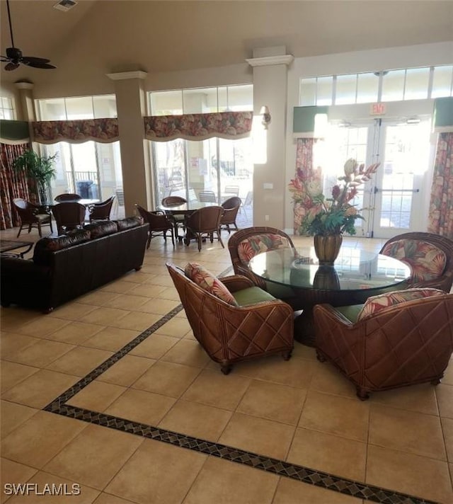 tiled dining room featuring ceiling fan