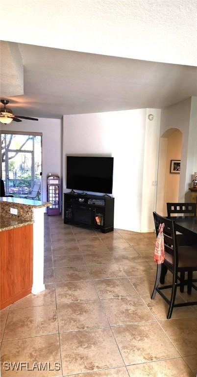 living room with ceiling fan