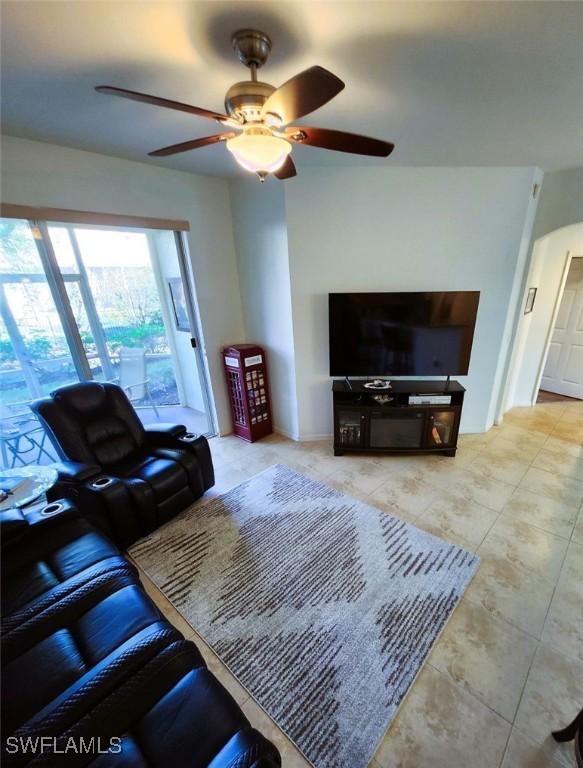 living room featuring ceiling fan