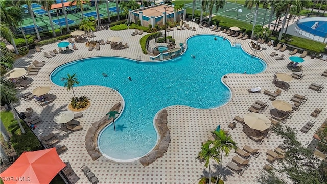 13538 Troia Dr, Estero, FL 33928 - pool featuring a patio