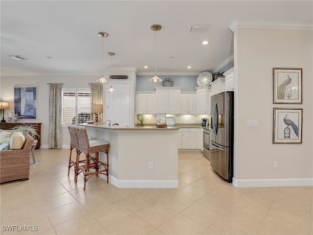 kitchen with stainless steel refrigerator with ice dispenser, white cabinetry, decorative light fixtures, ornamental molding, and a kitchen island with sink