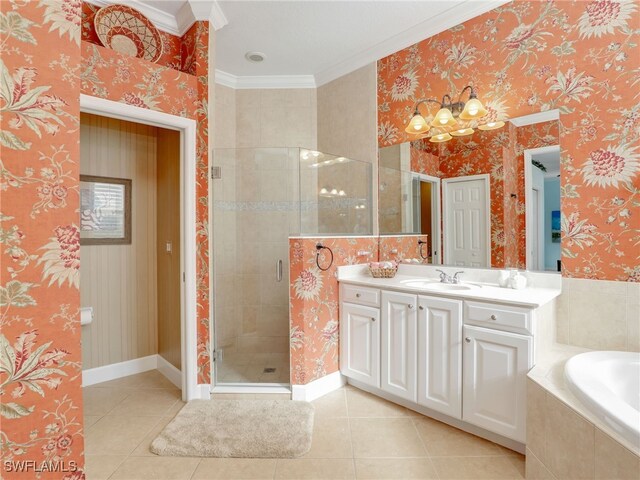 bathroom featuring independent shower and bath, vanity, crown molding, and tile patterned floors