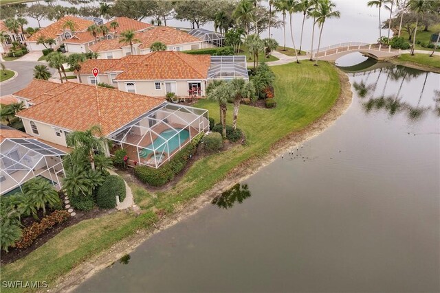 drone / aerial view featuring a water view