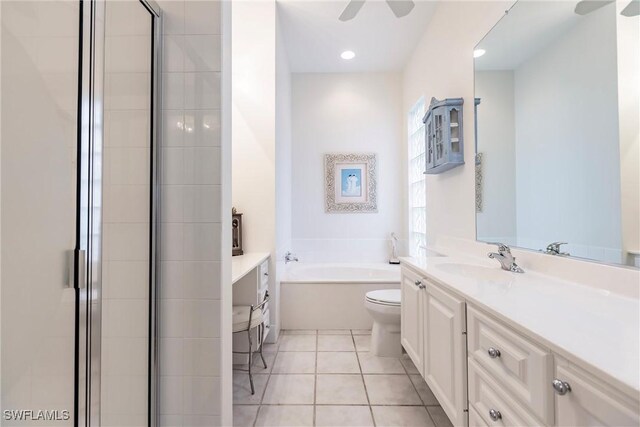 full bathroom featuring tile patterned floors, toilet, independent shower and bath, ceiling fan, and vanity