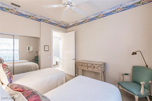 bedroom featuring a closet and ceiling fan