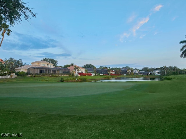 view of home's community featuring a water view