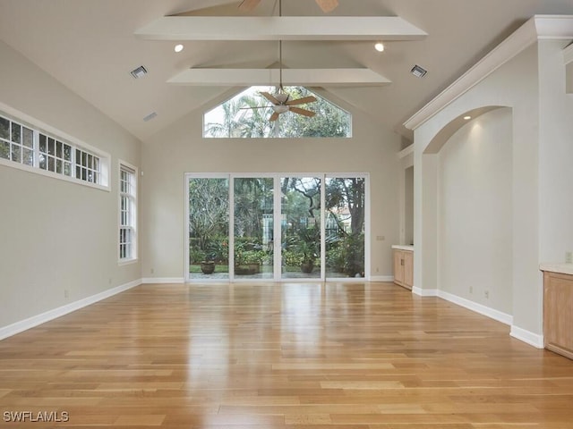 unfurnished living room featuring beamed ceiling, ceiling fan, high vaulted ceiling, and light wood-type flooring