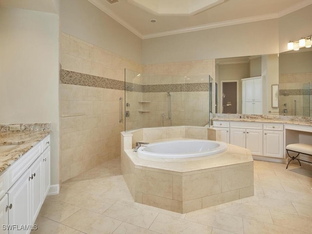 bathroom with independent shower and bath, vanity, and crown molding