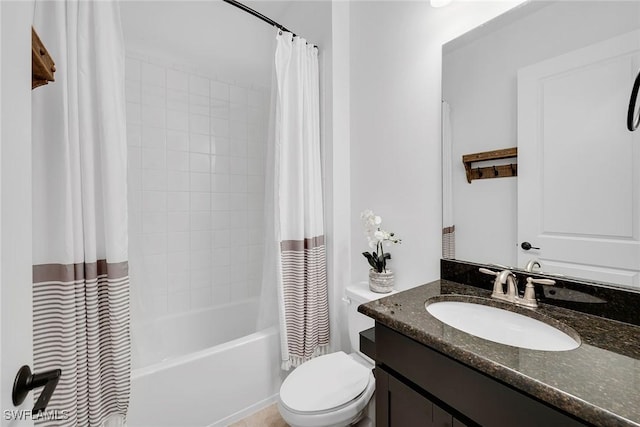 full bathroom with vanity, shower / bath combination with curtain, and toilet