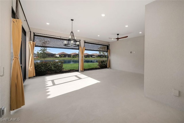 interior space featuring ceiling fan