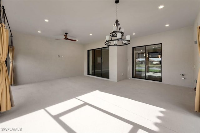 interior space with ceiling fan