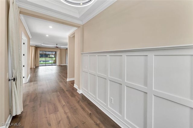 hall with crown molding and hardwood / wood-style flooring