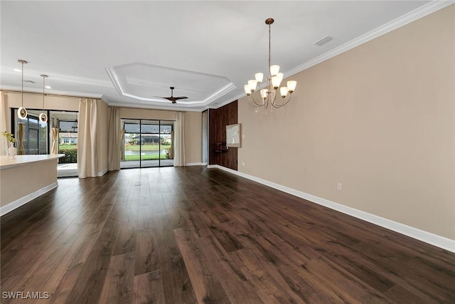 interior space featuring crown molding, dark hardwood / wood-style flooring, a raised ceiling, and ceiling fan with notable chandelier