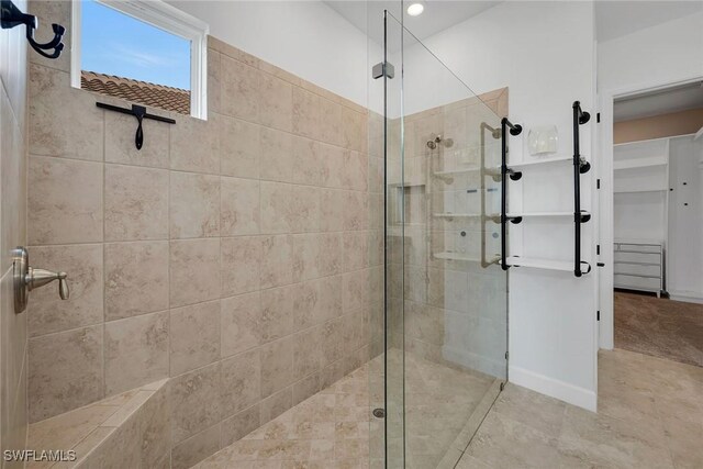 bathroom featuring an enclosed shower